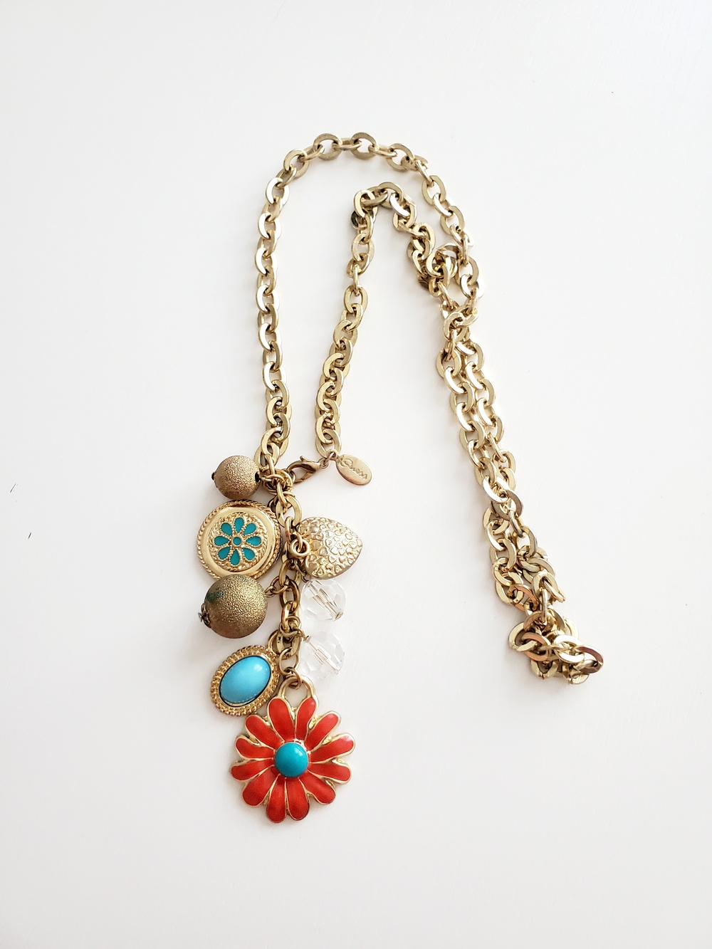 Guess Gold-Tone Necklace with Coral Flower and Turquoise Accents
